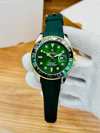 Rolex watch in | Green colour