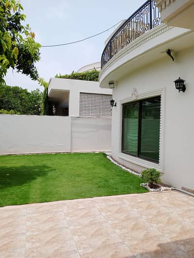 On 70-Feet Road 1 Kanal Top Location Double Unit Bungalow Is Available In The Best Block Of DHA Lahore.