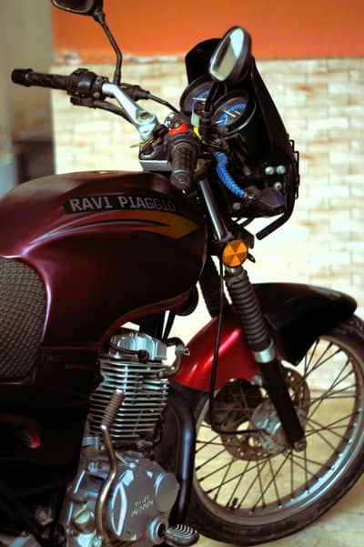 Ravi piaggio 125 better then GS150, honda 125,ybr value for money