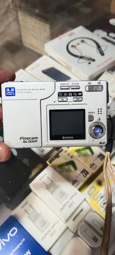finecam sl300r camera all ok 10by8 only camera no battery no charger