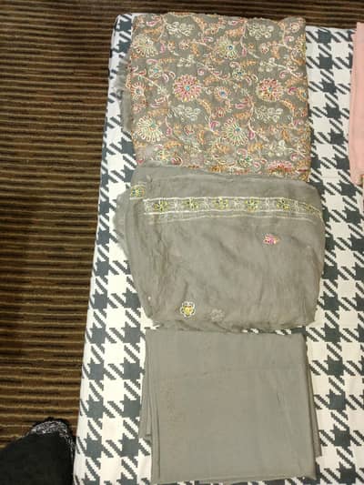 new unstitched fancy Kam Wala suit hai. available for sale