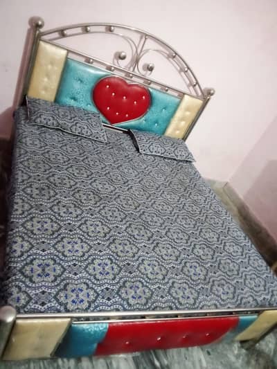 Steel frame bed