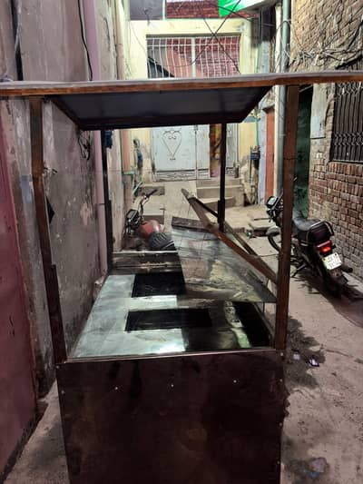 Fries Fast food stall counter with fryers