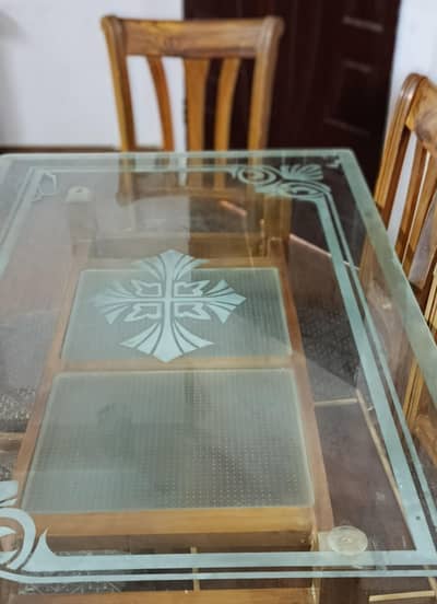 Glass dining table with 6 chairs