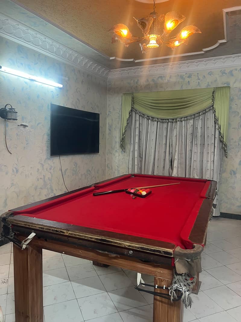 snooker table. 1