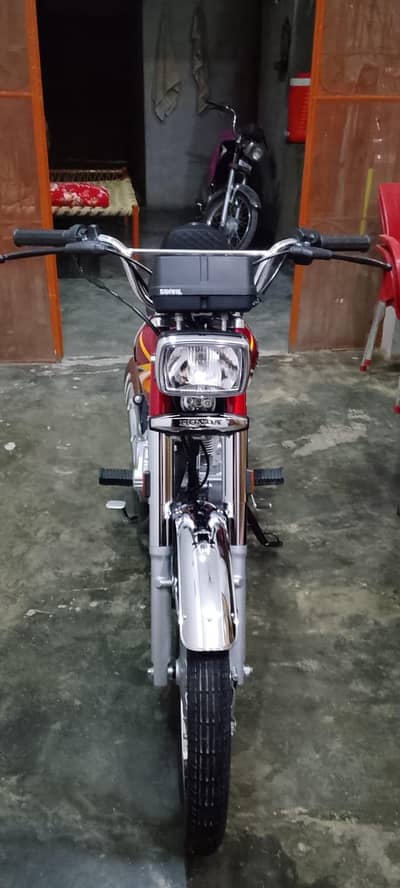 Honda 125 03074200804 red color 2025 k December me nikla ha