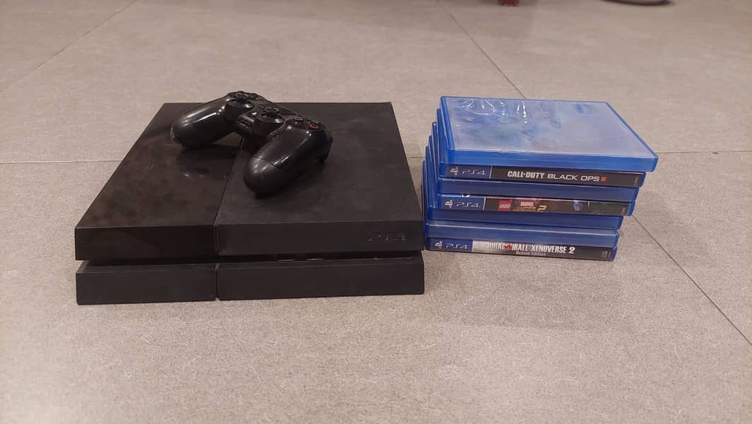 PS4 + Controller + 7 Games 0