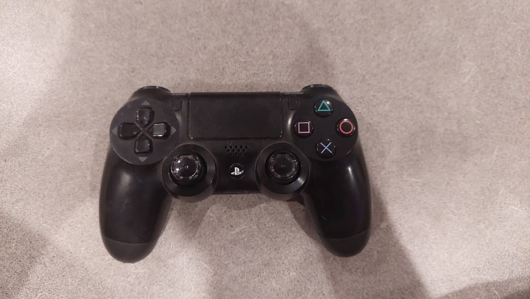 PS4 + Controller + 7 Games 1