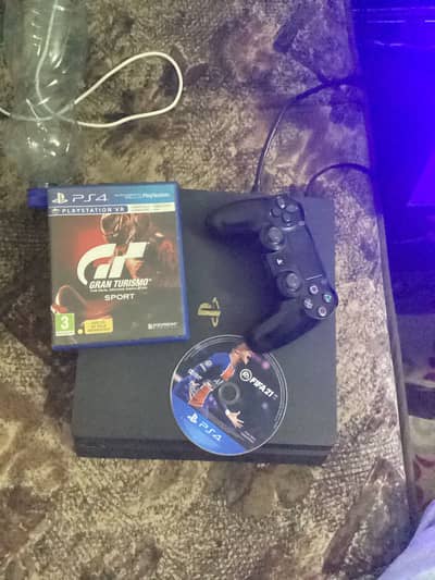 Ps4 Slim with 2 controllers and 2 Games For Sale