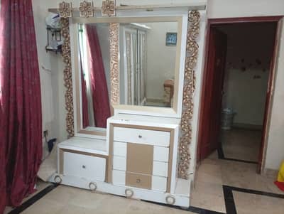 Shesham wood with deco finishes.