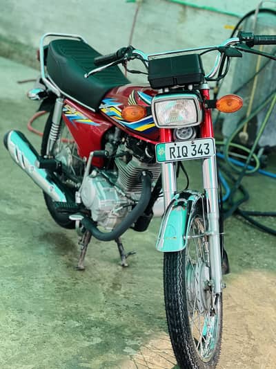 Honda 125 2018 model Rawalpindi num total genuine