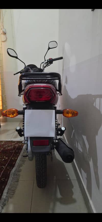 Suzuki 110 (only 500 km driven)