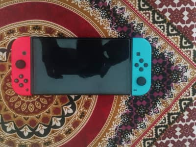 Nintendo switch OLED with 3 games in it non jail break