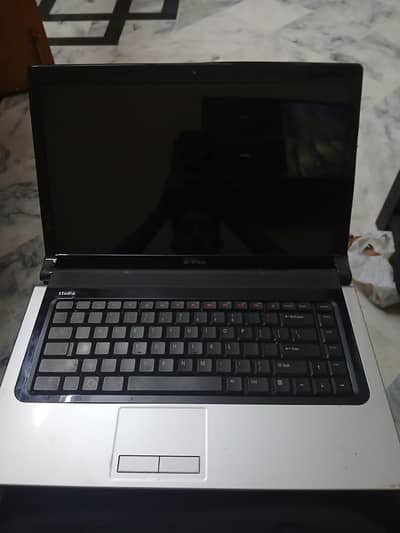 Dell Studio 1555 laptop with charger for sale