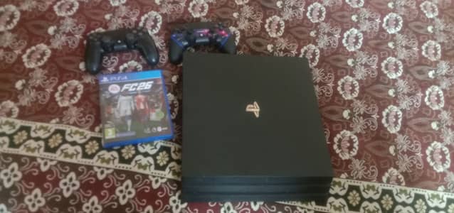 A PS4 pro slightly used with free fc26 DVD with 2 controllers