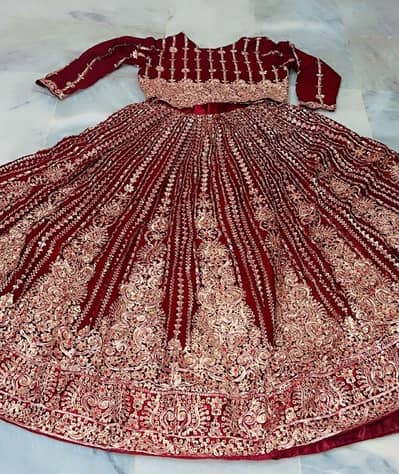 Bridel maroon heavy embrioded lehnga