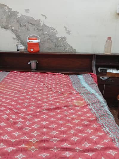 old used Double wooden bed