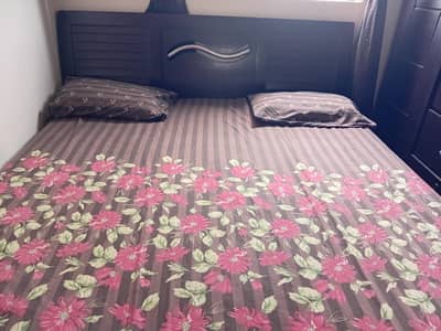 king size bed and 2 side tables