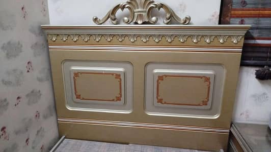 Elegant Single Bed with Ornate Headboard & Platform Base