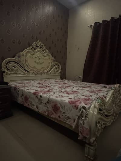 This bed is made by real wood and antique desing