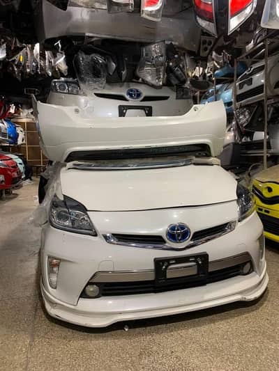 Toyota Prius pearl white colour g sports complete body parts available