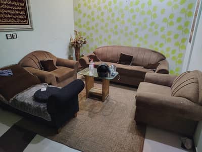 5 seater sofa set with carpet.