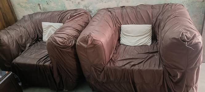 4 seater off white sof with 4 cushions with Brown cover