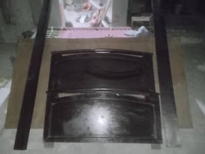 single wooden bed