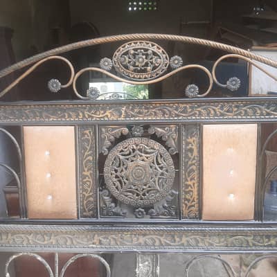 iron bed with centre frame