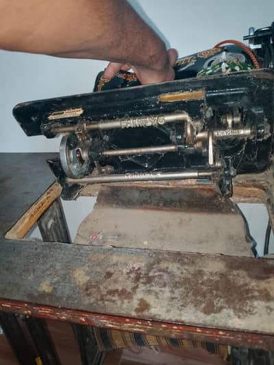 used sewing machine with paidan nd motor.