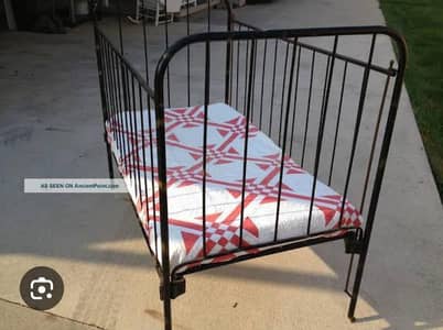 Baby bed with mattress