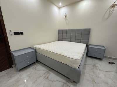 King size bed with new mattress and side tables (new)