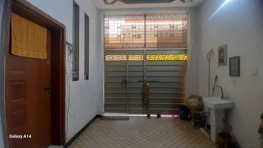 2.5 Marla House With 4 Rooms And Attached Bathrooms. Water And Electricity Available. Located In A Good Area Near The Main Road, Perfect For Family Living.