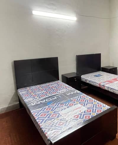 single beds with sitable and mattress in good condition