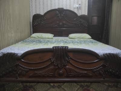 King bed with mattress and dressing .