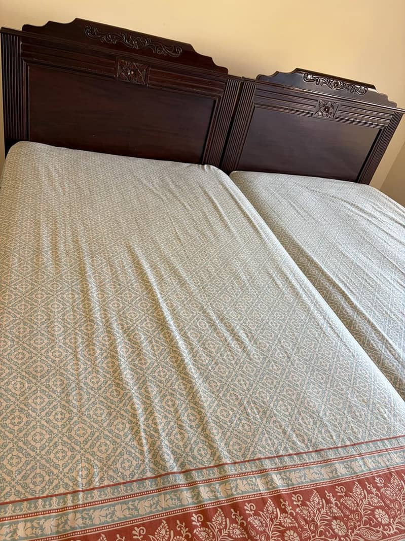 single beds with one side table 1