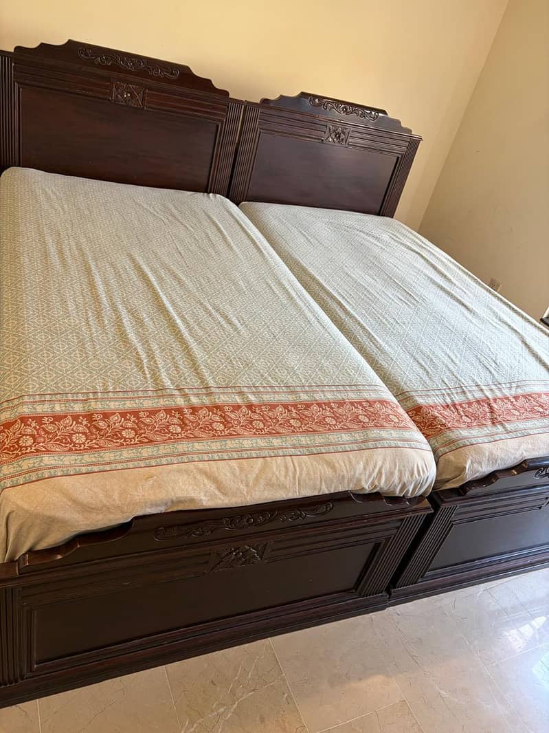 single beds with one side table 2