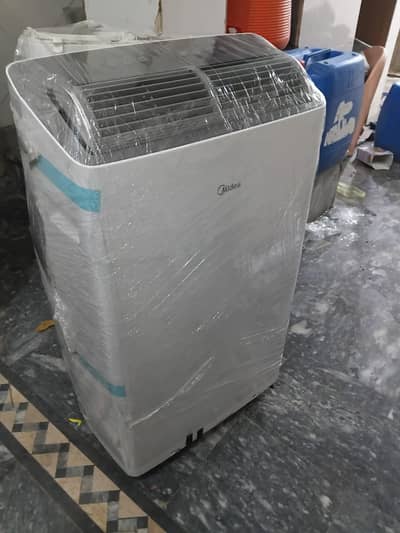 midea midea sawa ton portable ac like new condition with supplyer