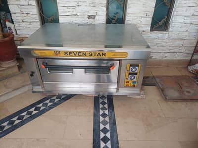 Seven star pizza owner machine electric and gas in good condition
