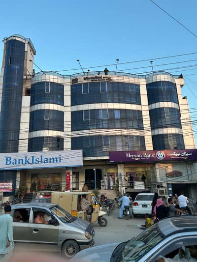 SHOP FOR RENT ADYALA TOWER, Rawalpindi. Ideal For Pharmacy, Clinic, Or Retail. Spacious Shop With Glass Door, Bright Lighting, On Main Road With Parking. CCTV-Enabled, Rs. 20,000/Month.