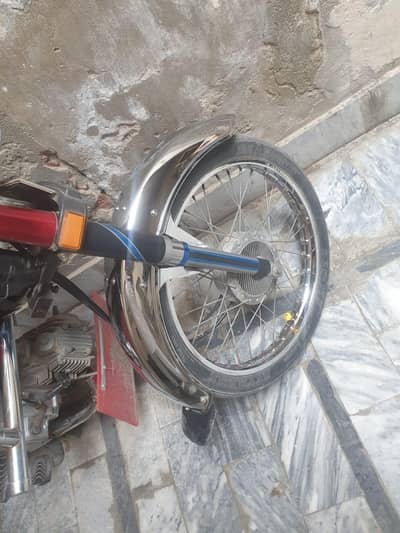 Honda CD 70 motorcycle red colour 03.21. 79.55. 031