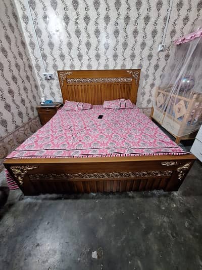 bed with side table