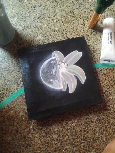 painting of moon along flower