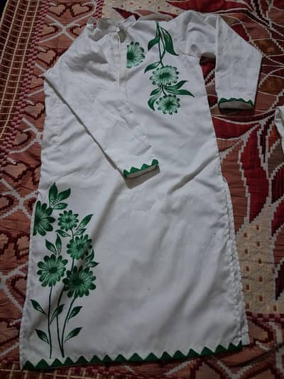 Handmade design on shirt with pain