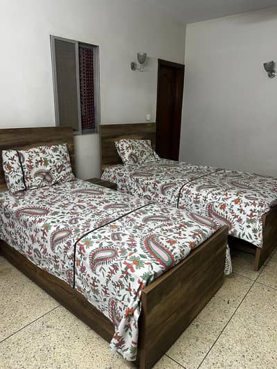 Two Single Beds and two Side Tables for sale