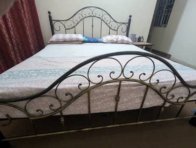 King Size wrought iron bed, 2 side Tables and Dressing. No Mattress