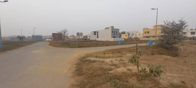 With All Dues Clear Plot No-3474 Block B - 5 Marla Plot On Top Location of Phase 9 Town DHA Lahore For Urgent Sale