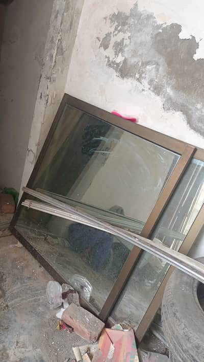 Almunimu window with green murcury glasess