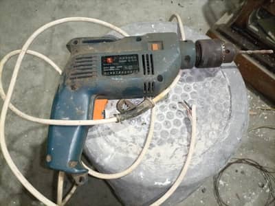 Impact drill machine