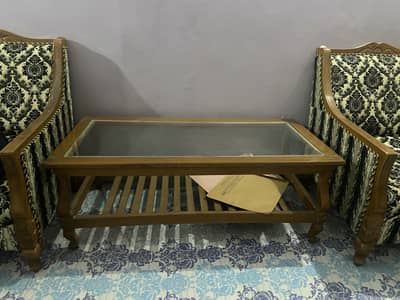 Wooden glass table.